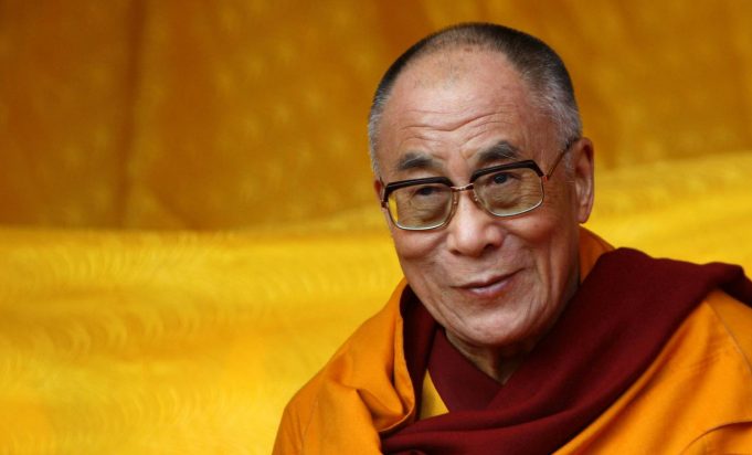 FILE PHOTO: Tibetan spiritual leader the Dalai Lama watches a dance performance on the last day of his teachings in Tawang